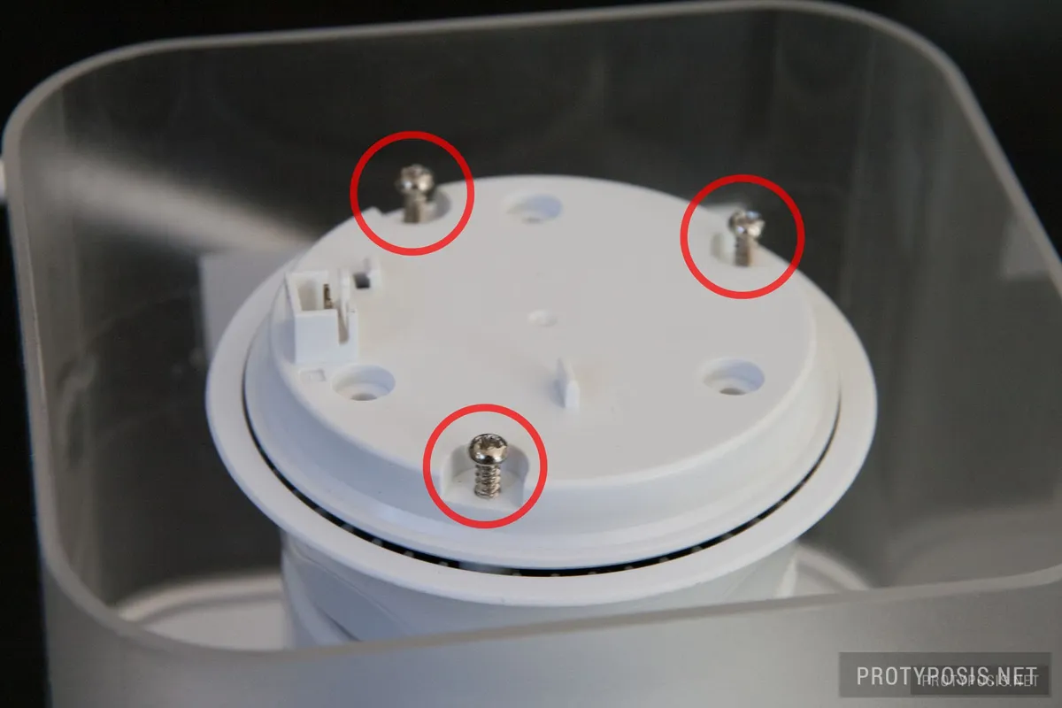 6) Remove another 3 screws and pry open