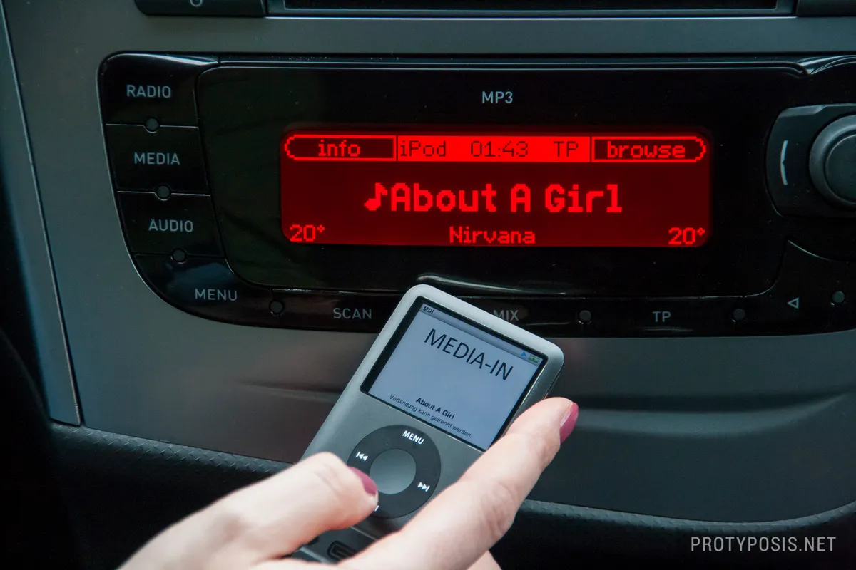 Before: an iPod connected to a car